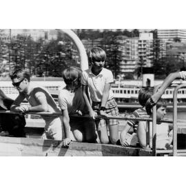 People looking over the railing at the top of Marineland, Manly, c1967–1973