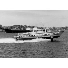 Fairlight hydrofoil passing a cargo ship on the harbour, Manly, c1967–1973 