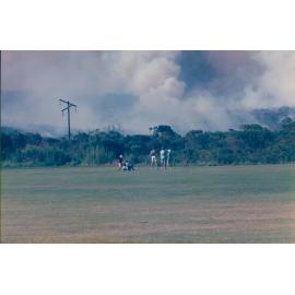Smoke from bush fire viewed from field, Allambie Heights, 1990