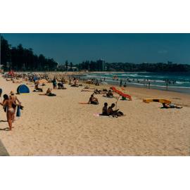 Beach activity along the shoreline at Manly Beach, Manly, 1997