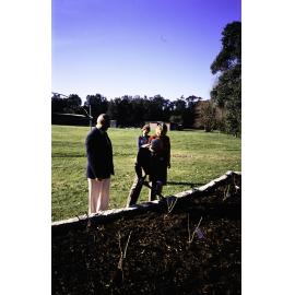 Two individuals planting at the opening of the Nelson Heather Centre Bicentennial Rose Garden, Warriewood, 1988