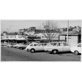 Looking east from the library carpark towards Pittwater Road and Howard Avenue, Dee Why, c1970s